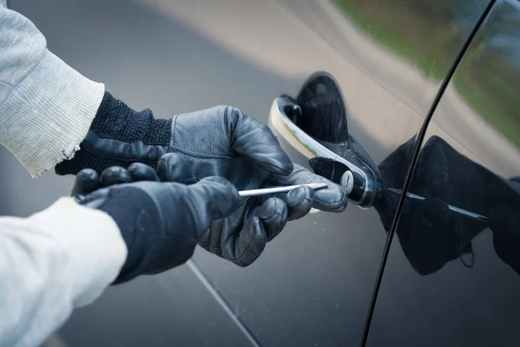 thief breaking into car